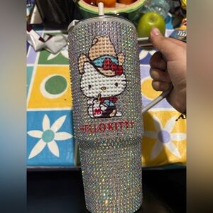 Hello Kitty Silver and Red Bird Toy